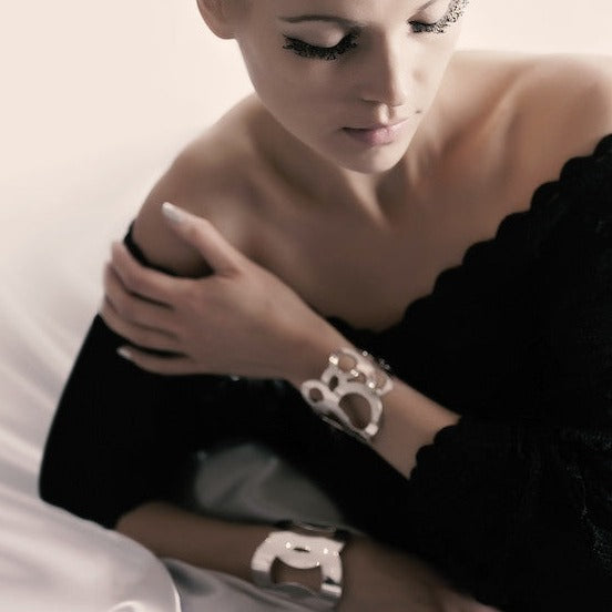 A chunky statement cuff from Circles collection. Material: 925 silver-plated brass. Size: adjustable, fits any wrist.