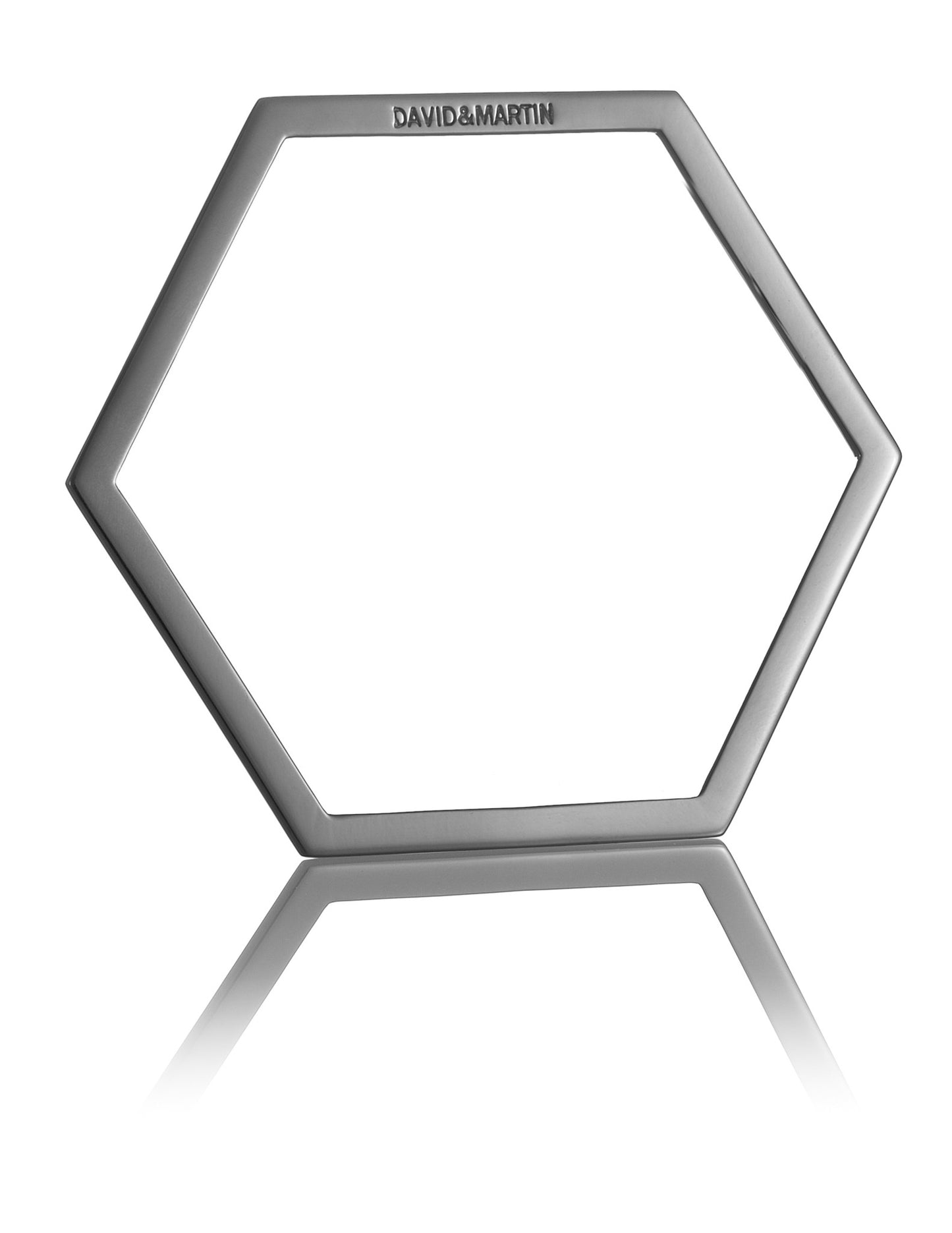 Minimalist hexagon-shaped bangle from Cell collection. Signature geometric design. Material: 925 silver.