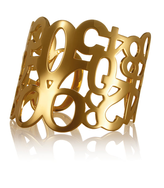 Conceptual chunky cuff bracelet from popular Numbers collection. Material: 18 karat gold-plated silver. Size: adjustable, fits any wrist.