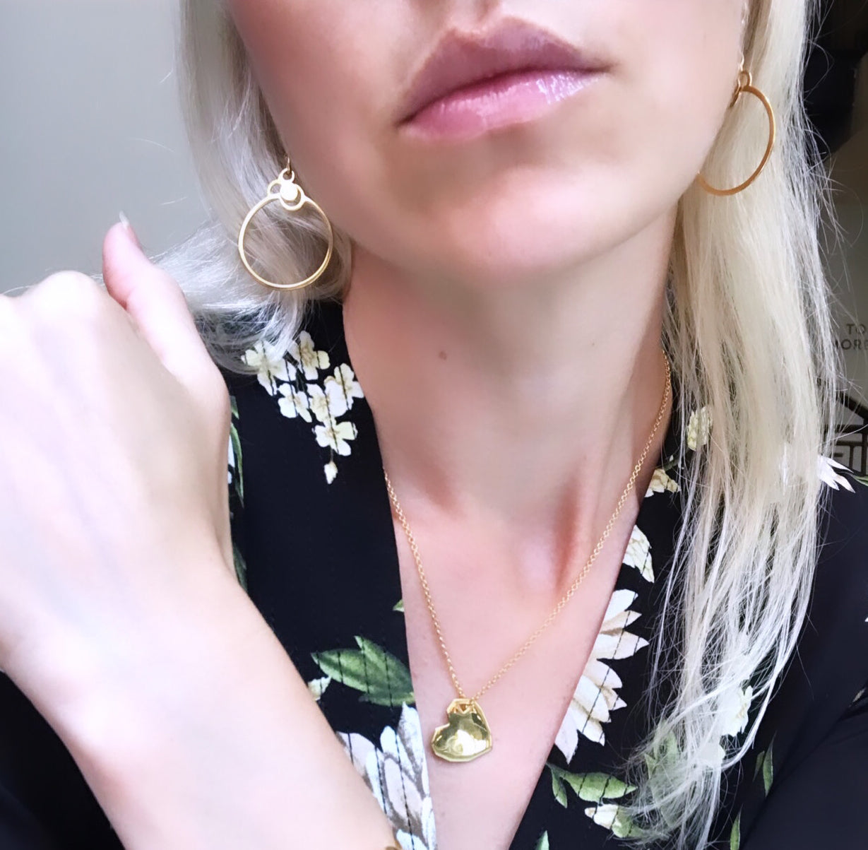 Extra light, gentle hoop earrings with a logo from Circles collection. Material: 18 karat gold-plated silver. Size: hoop diameter - 3cm.