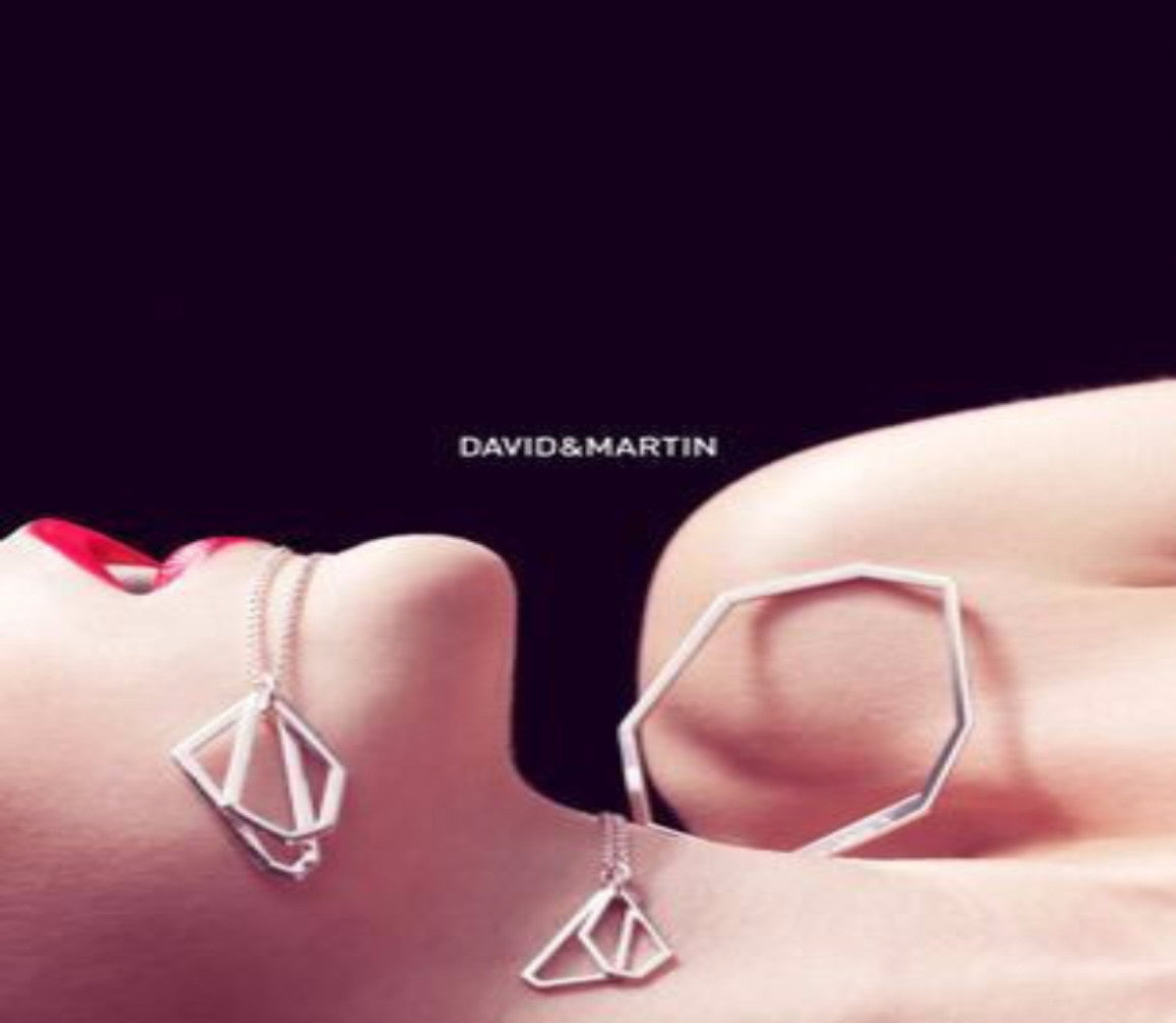 Minimalist bangle bracelet from iconic Facet collection. Material: 925 silver.