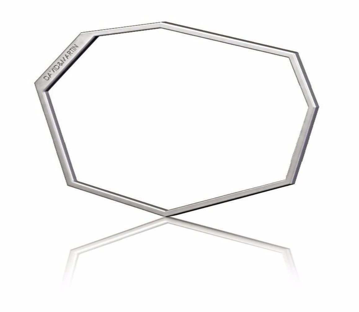 Minimalist bangle bracelet from iconic Facet collection. Material: 925 silver.