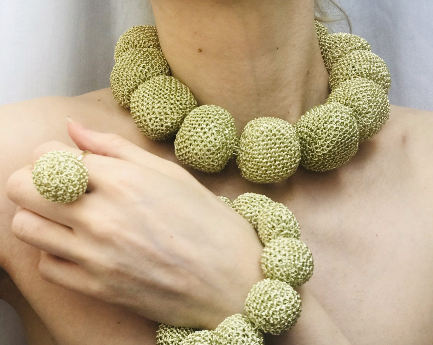 Unique, one of a kind, handcrafted statement Perle D'Oro necklace from Venice collection. The necklace is made of oversized gold-plated wire pearls. Venice collection is designed in Stockholm, Sweden and inspired by the beauty and traditions of Venetian culture. It brings together the Scandinavian aesthetics and its tendency towards simplicity with the allure and colourful, sophisticated lavishness of Venice.