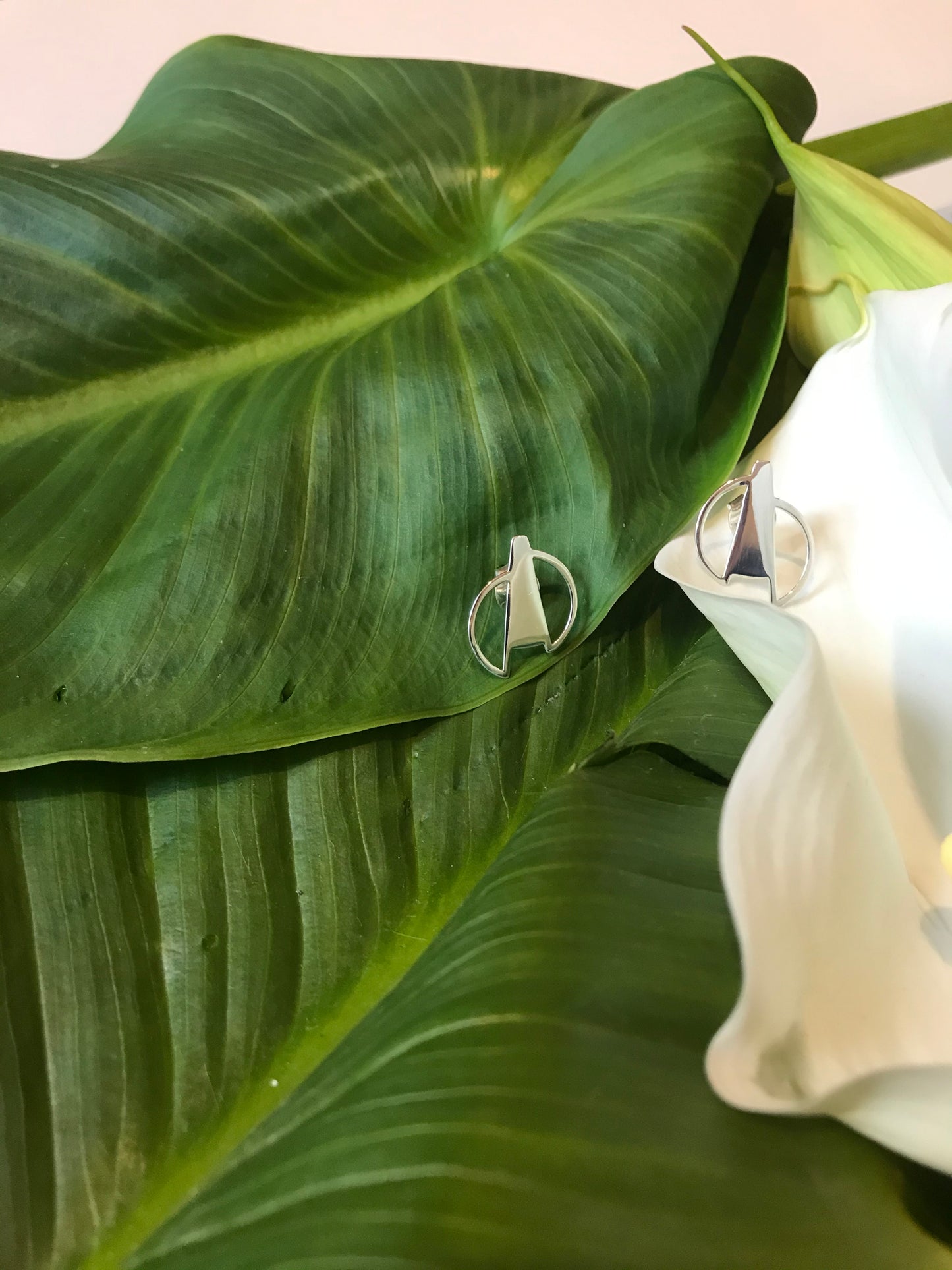 Minimalist earrings from Drift collection. This design represents deconstructed circles and is inspired by the imperfection of life.