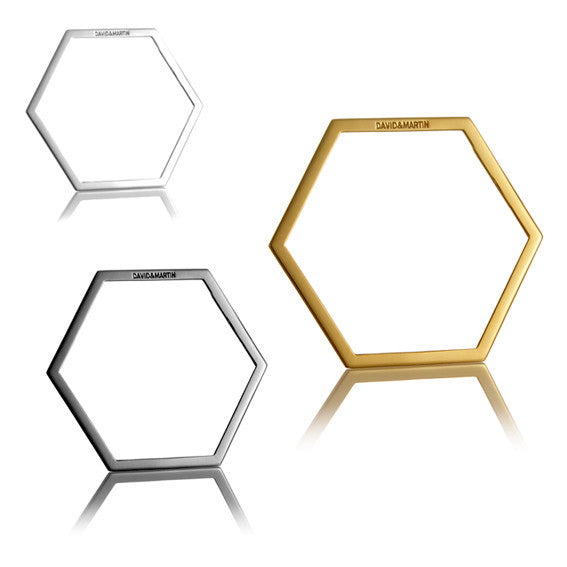 Minimalist hexagon-shaped bangle from Cell collection. Signature geometric design. Material: 925 silver.
