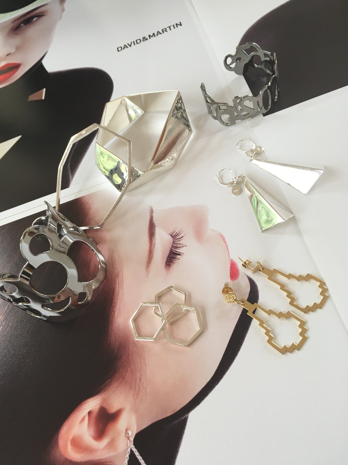 Minimalist bangle bracelet from iconic Facet collection. Material: 925 silver.