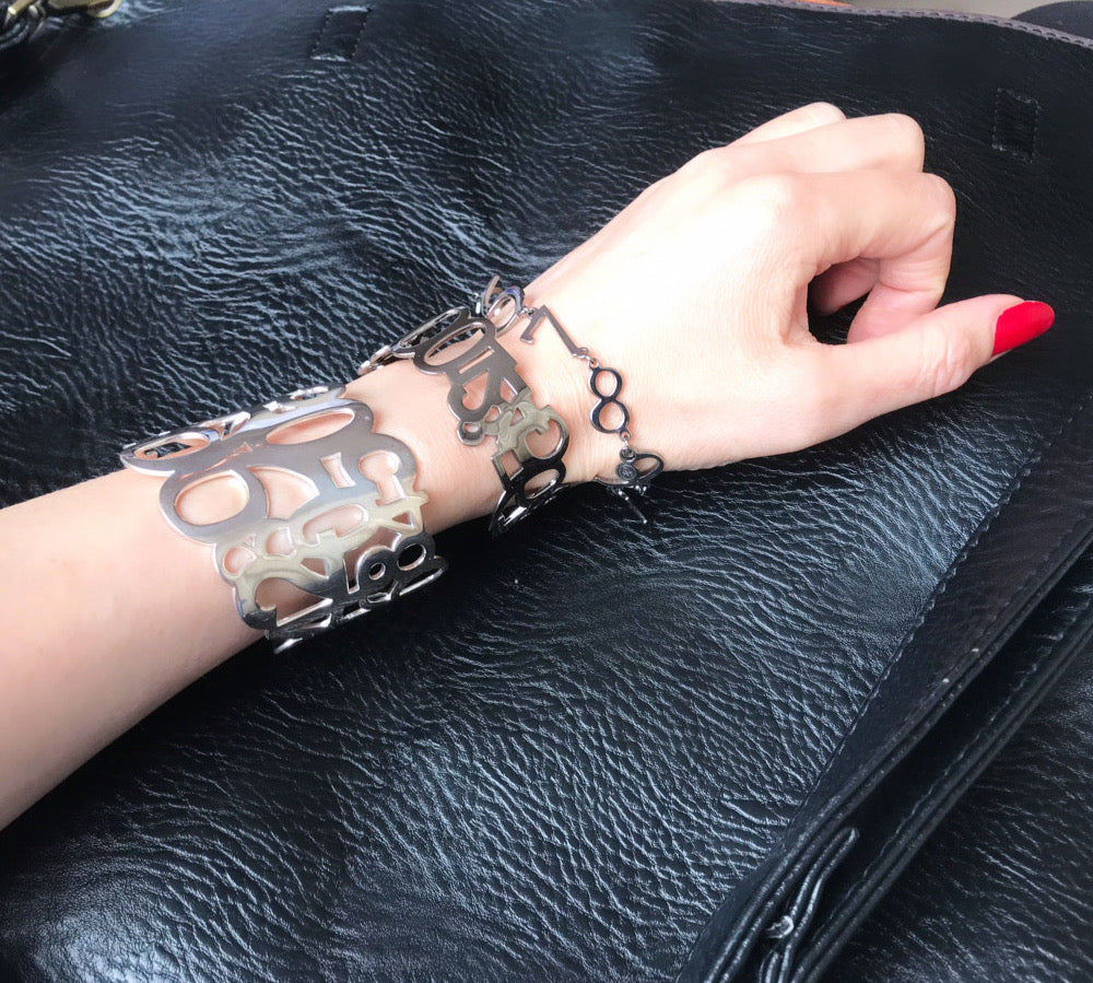 Stunning bracelet in 925 oxidised silver from iconic Numbers collection. Gentle on the arm, the bracelet features perfectly elaborated 1 to 9 design. Material: 925 silver, oxidised 