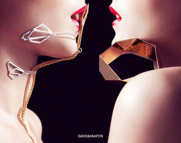 Striking, chunky statement bangle bracelet from iconic Facet collection.  Material: 18 karat gold-plated silver.