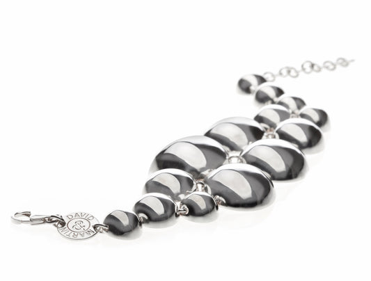 A solid silver bracelet from conceptual futuristic Cosmic Collection.