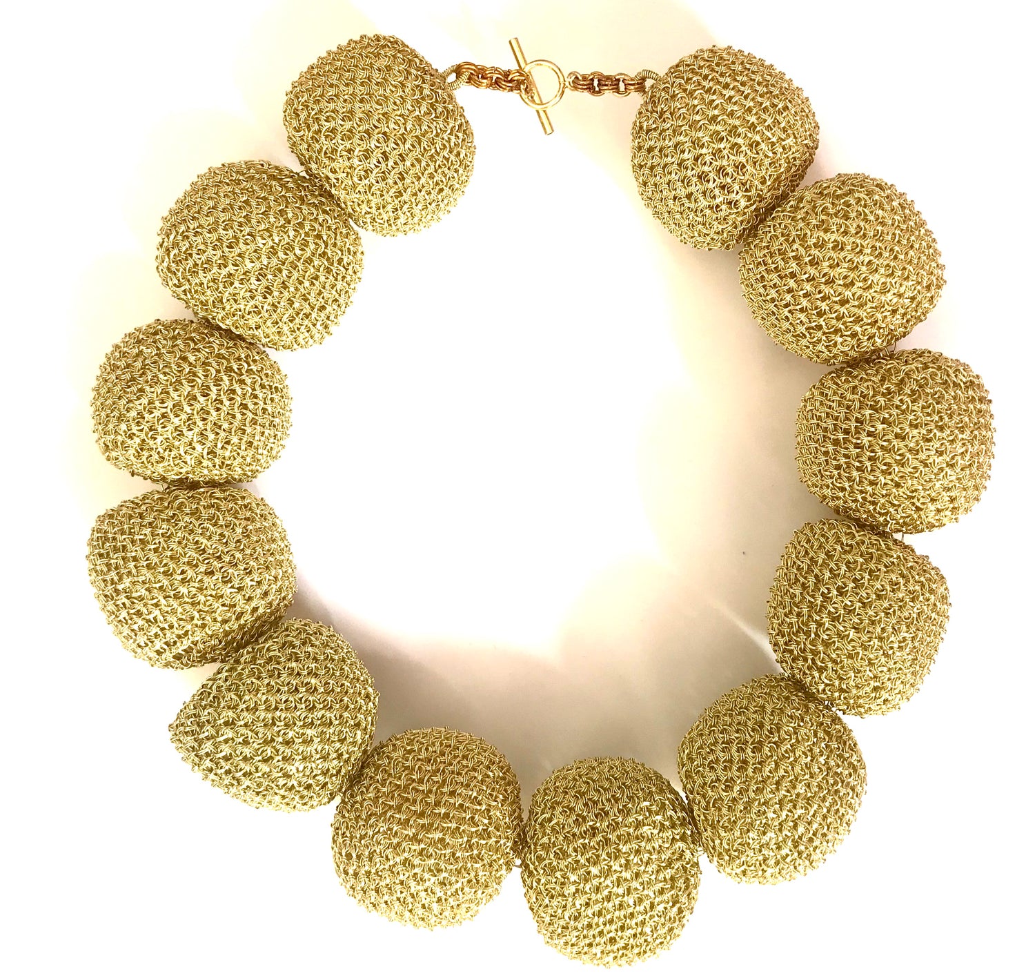 Unique, one of a kind, handcrafted statement Perle D'Oro necklace from Venice collection. The necklace is made of oversized gold-plated wire pearls.  Venice collection is designed in Stockholm, Sweden and inspired by the beauty and traditions of Venetian culture. It brings together the Scandinavian aesthetics and its tendency towards simplicity with the allure and colourful, sophisticated lavishness of Venice. 