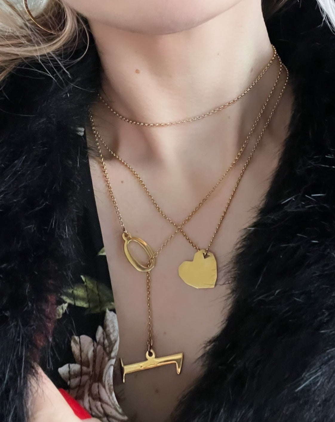 Long slip-through necklace with Zero and One pendants from Numbers collection. The chain is long enough to be wrapped around the neck twice and the item can be worn as long necklace or a choker with a pendant.   Material: 18 karat gold-plated 925 silver.  Size: 90cm.